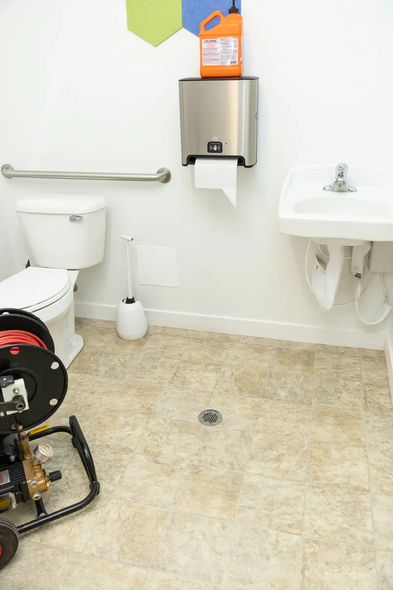 Drain machine set up in a restroom in St. George, UT