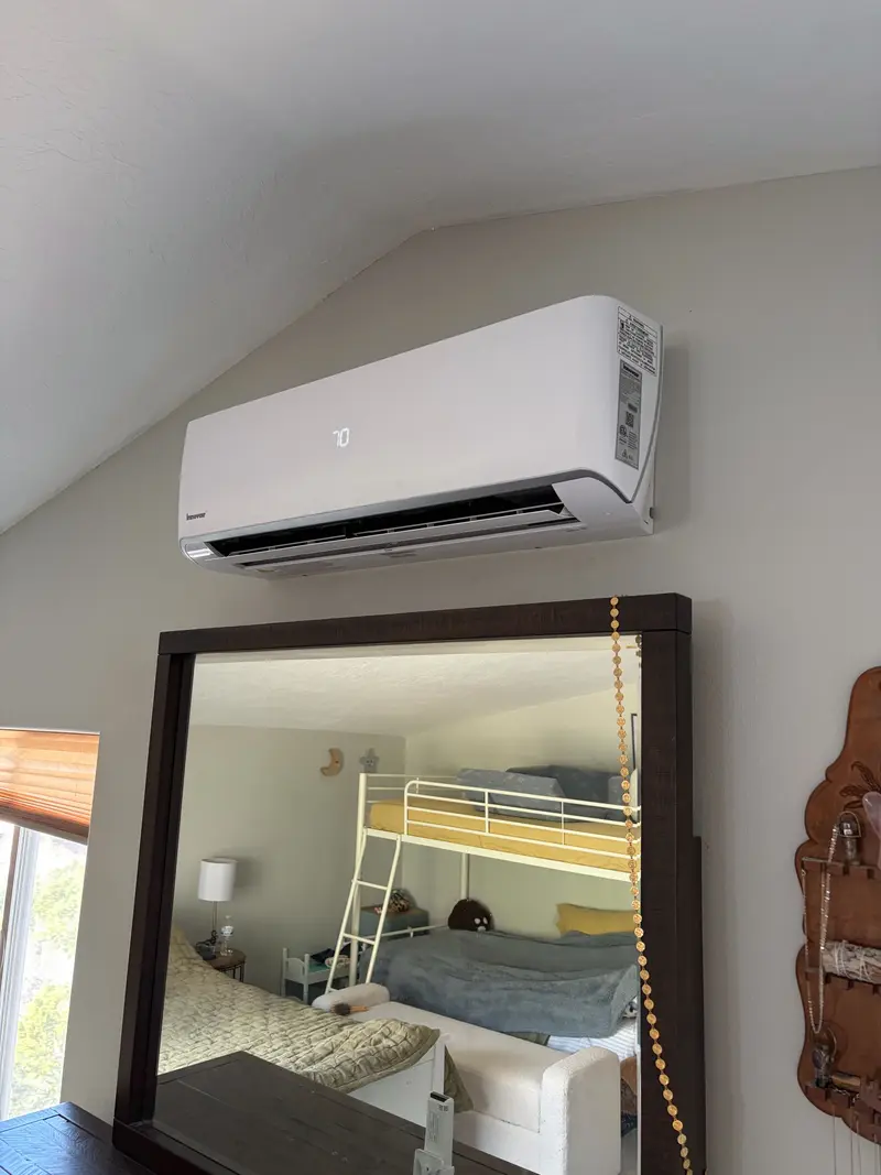 Ductless mini split indoor unit on a bedroom wall in St. George, UT