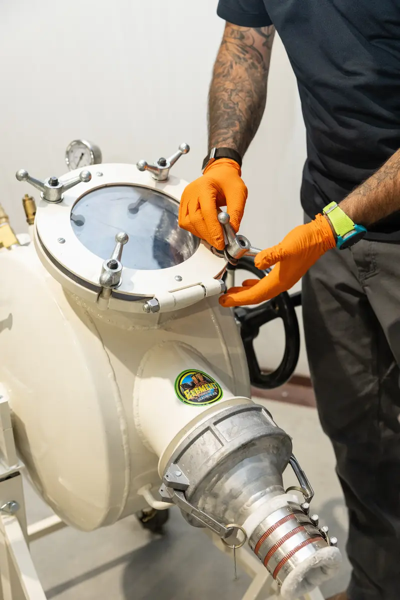 Element technician sealing a filter housing lid in St. George, UT