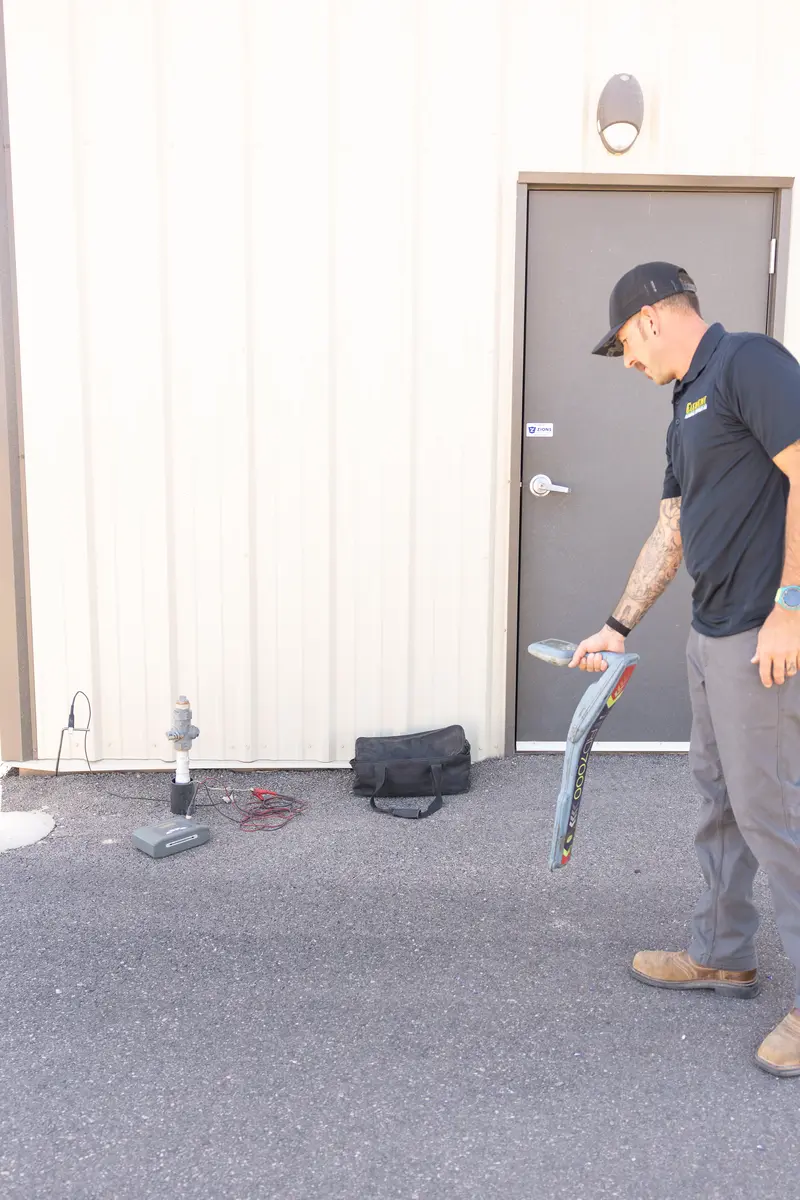 Element technician tracing a buried water line in St. George, UT