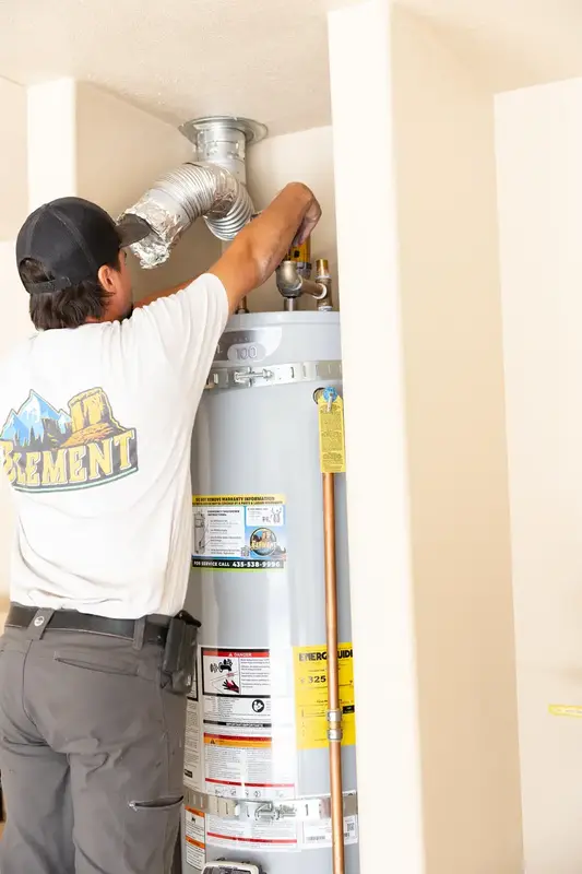 Element technician working on a water heater in St. George, UT