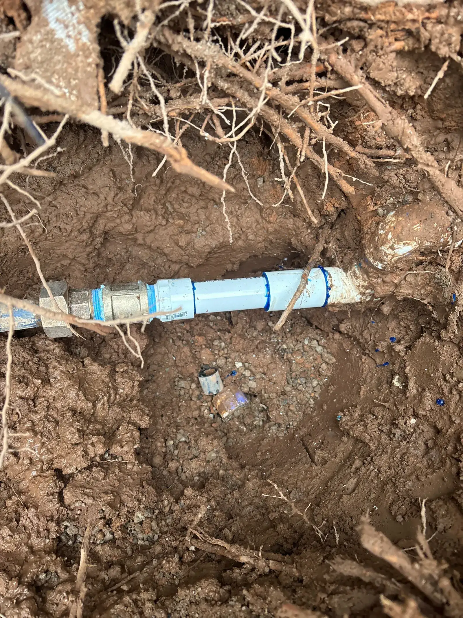 Element plumber installing a new water line in a trench in St. George, Utah