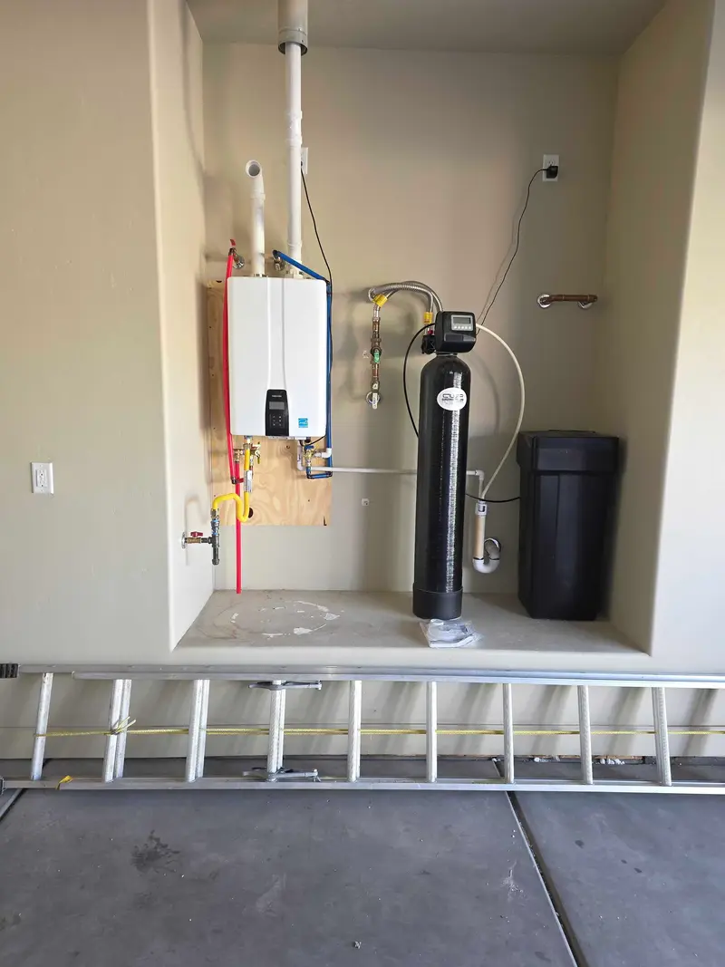 Tankless water heater and water softener in a garage in St. George, UT