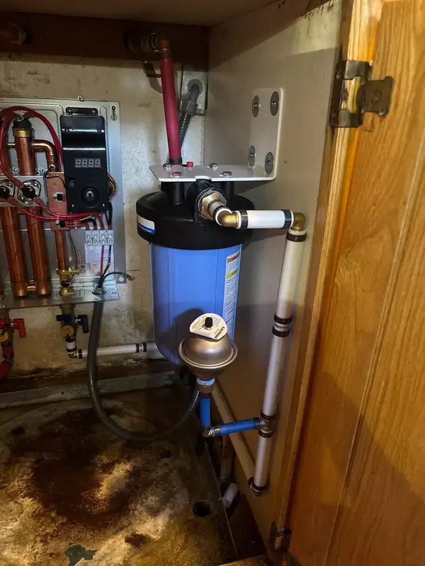 Whole house filter housing feeding a treatment system in St. George, UT